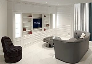 Libreria su misura a parete intera in stile elegante, realizzata da Lo Cascio Arredamenti
